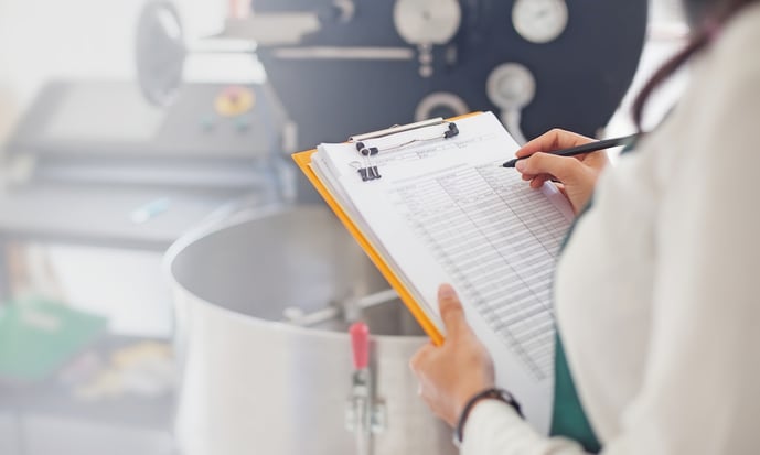 Woman with clipboard checklist