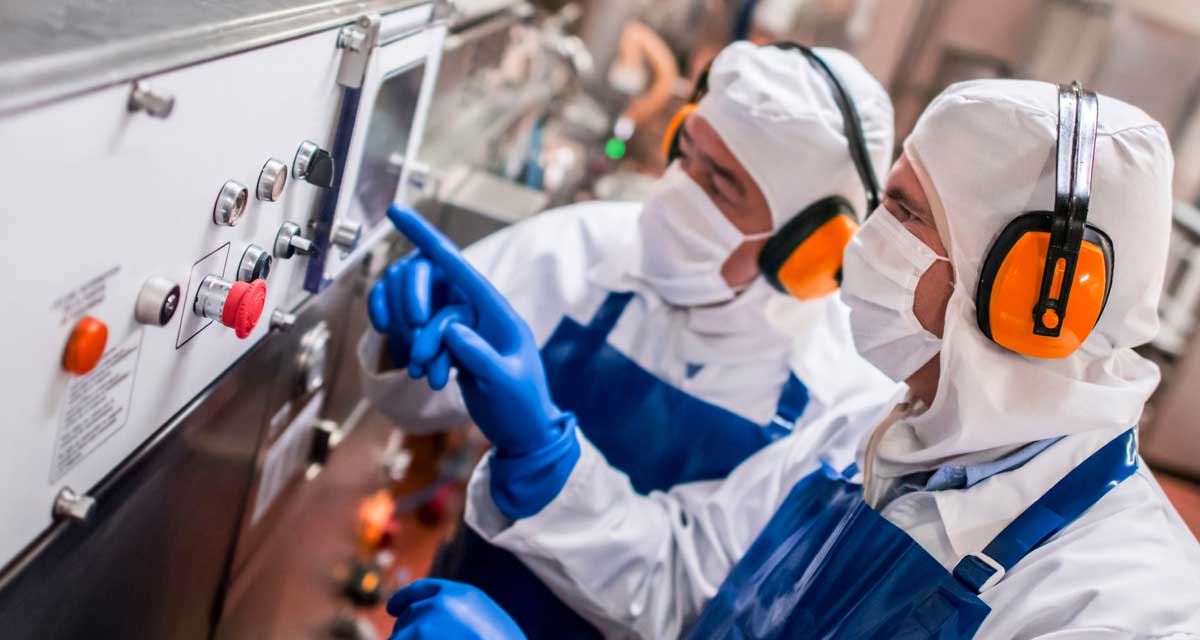 two_workers_with_ppe_starting_equipment